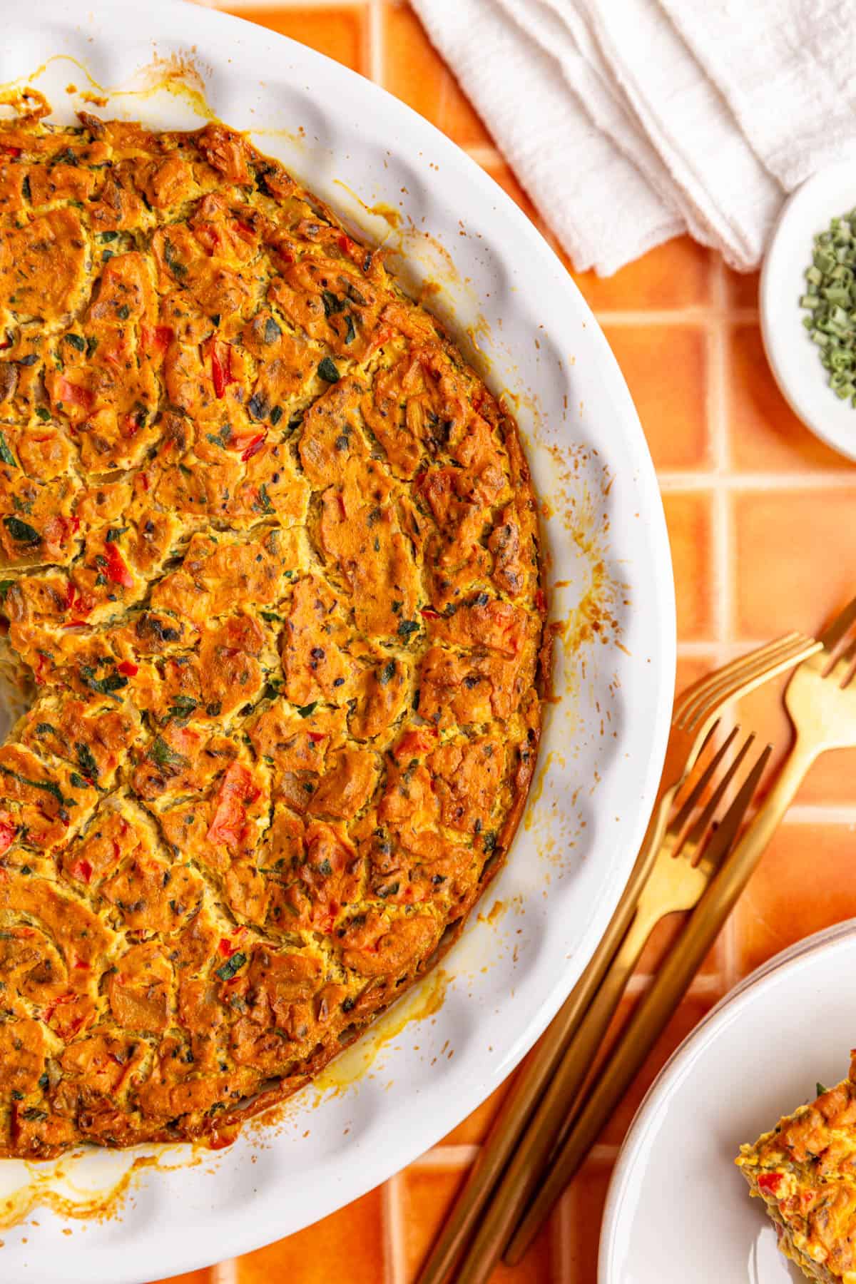 A freshly baked frittata, with a golden brown crust.