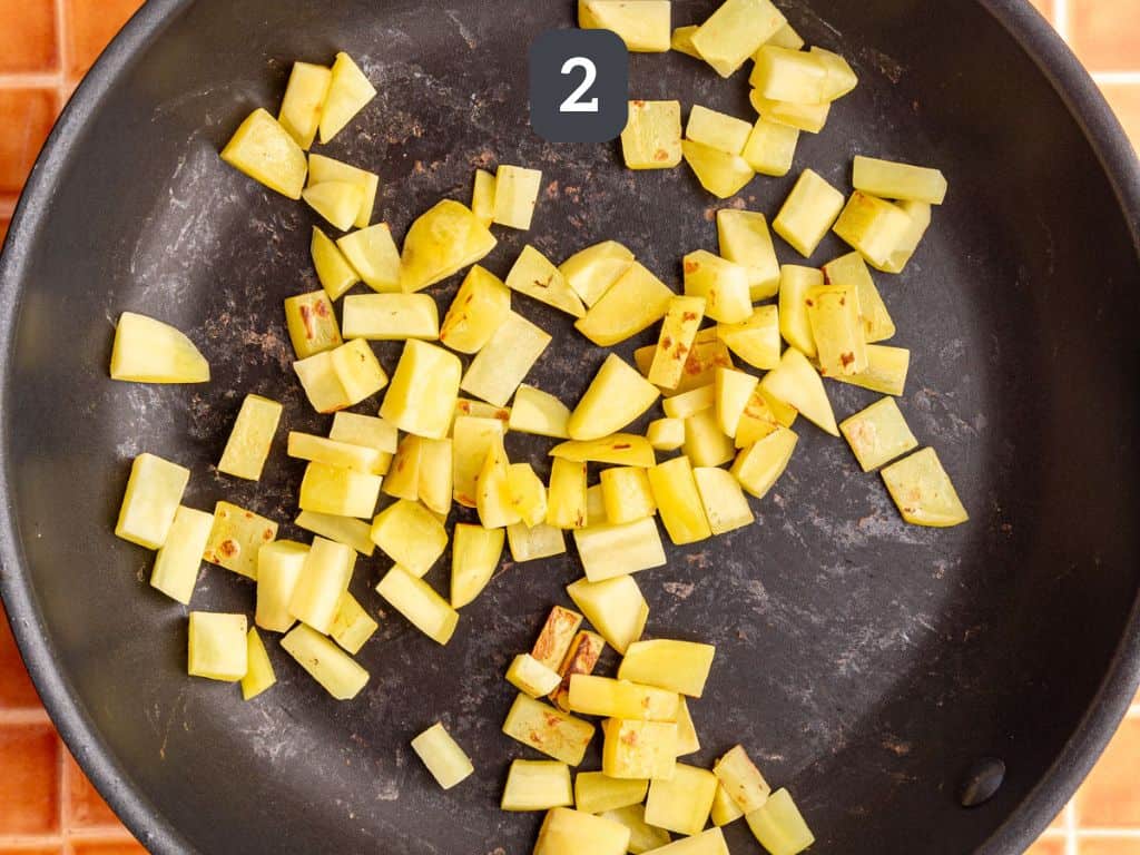 Vegan frittata step 2 - sauté the potatoes.