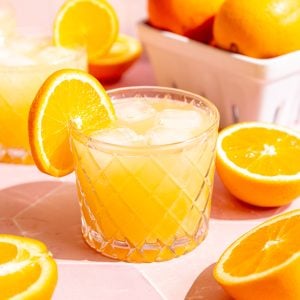 A glass of aperol spritz in the sun.