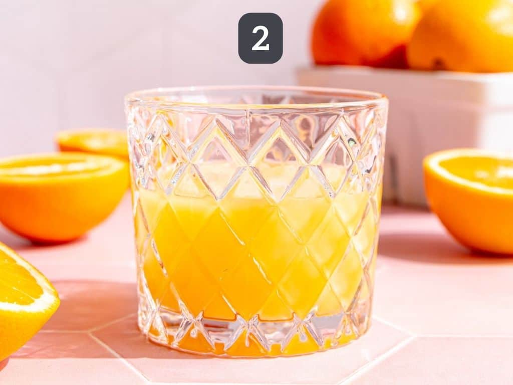 Aperol Spritz Mocktail Step 2 - add the ice.