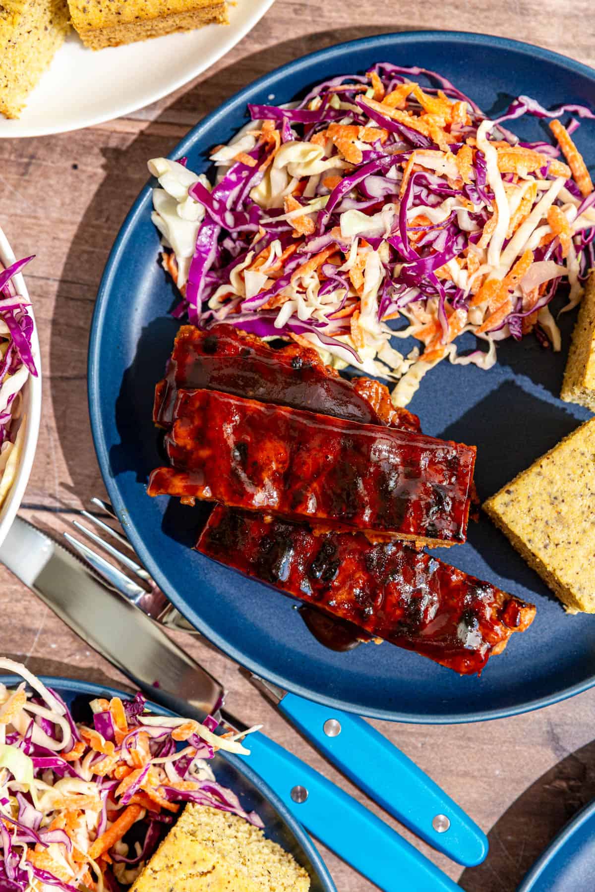 A few seitan ribs dripping with bbq sauce.