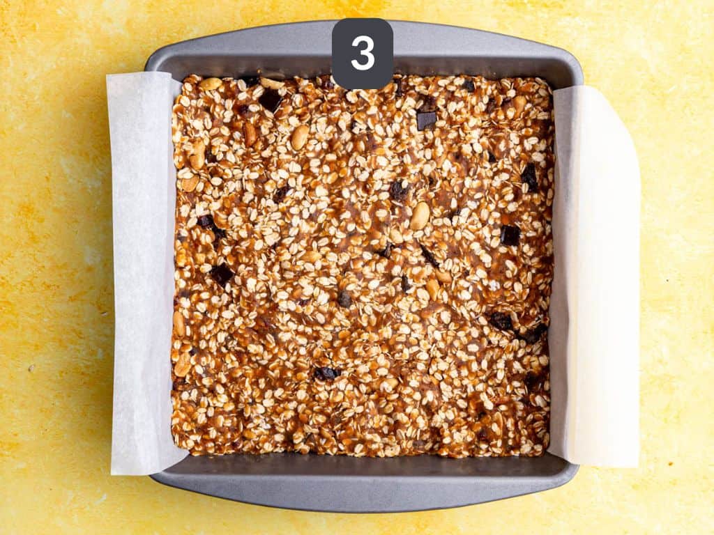 Banana granola bars step 3 - press the mixture into a pan and freeze.