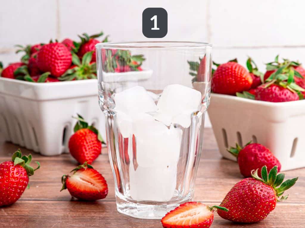 Strawberry cream soda step 1 - add ice to the glass.