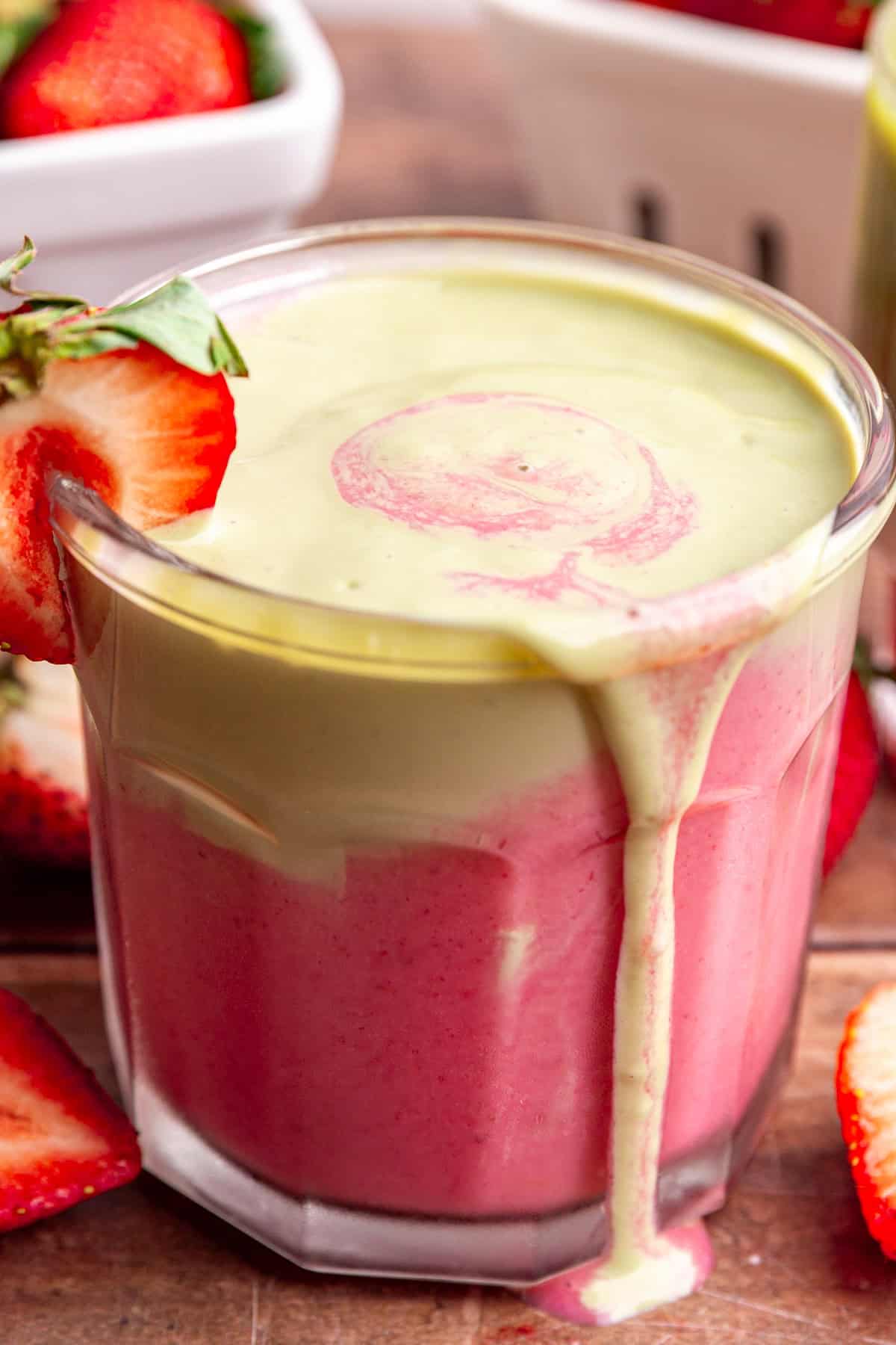 A close up view of the creamy texture of the strawberry matcha smoothie.