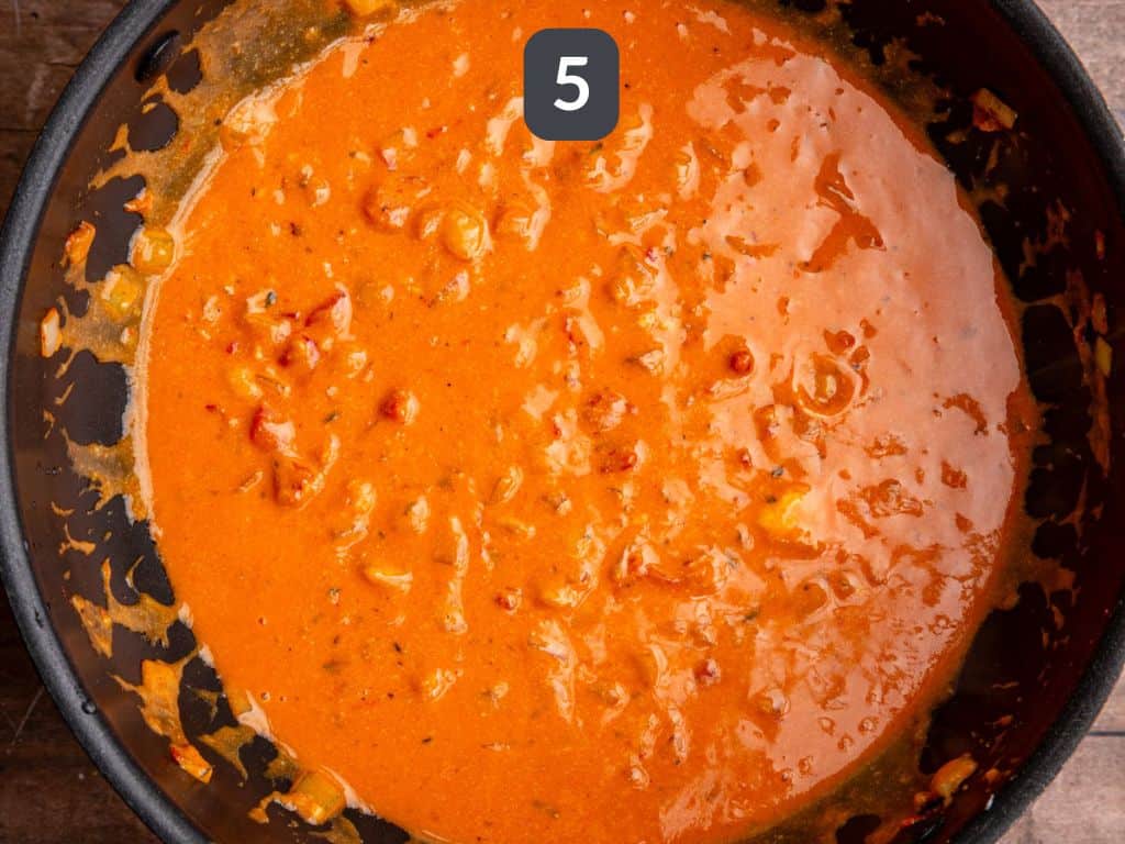 Vegan Marry Me Pasta Step 5 - add the tomatoes and cream cheese.