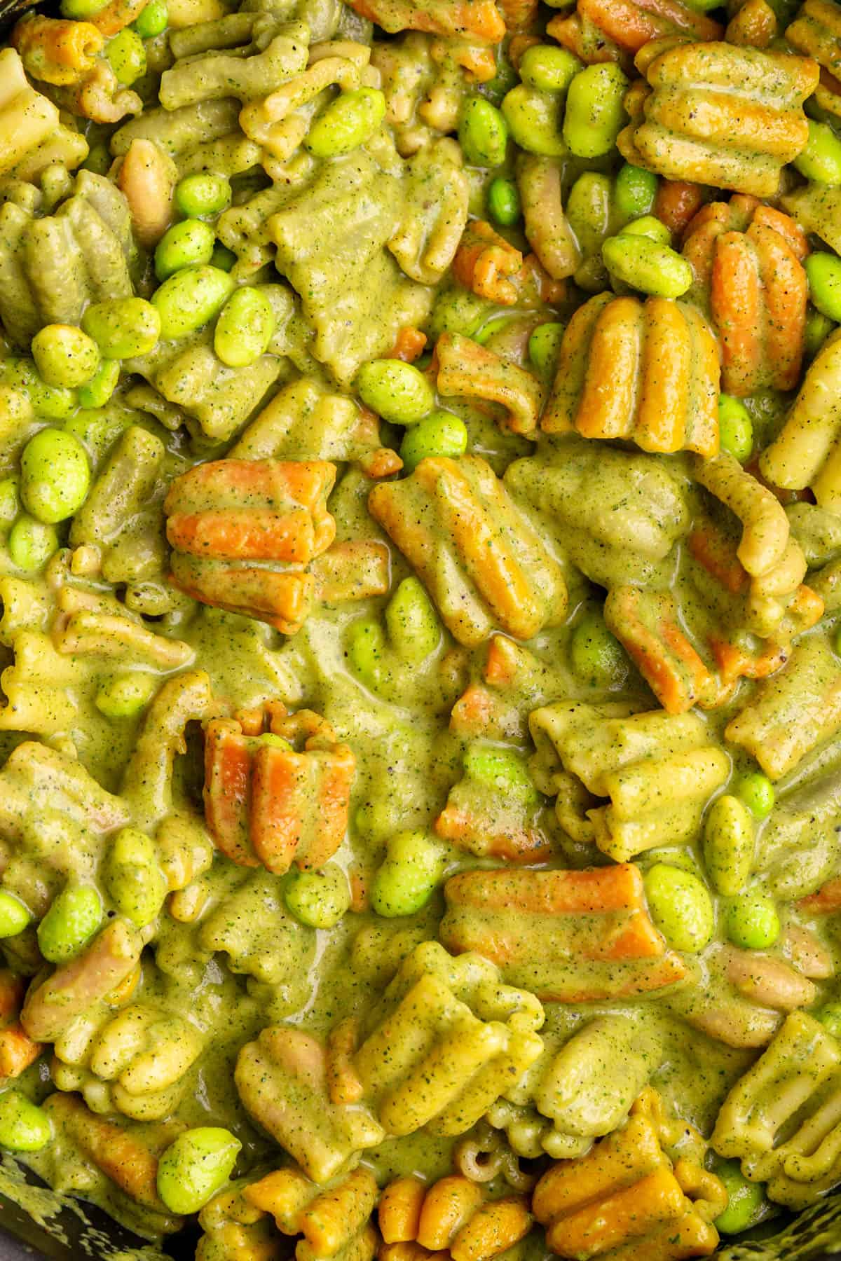 A close up view of the creamy texture of the zucchini pasta.