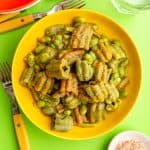 A bowl of vegan zucchini pasta, ready to eat.