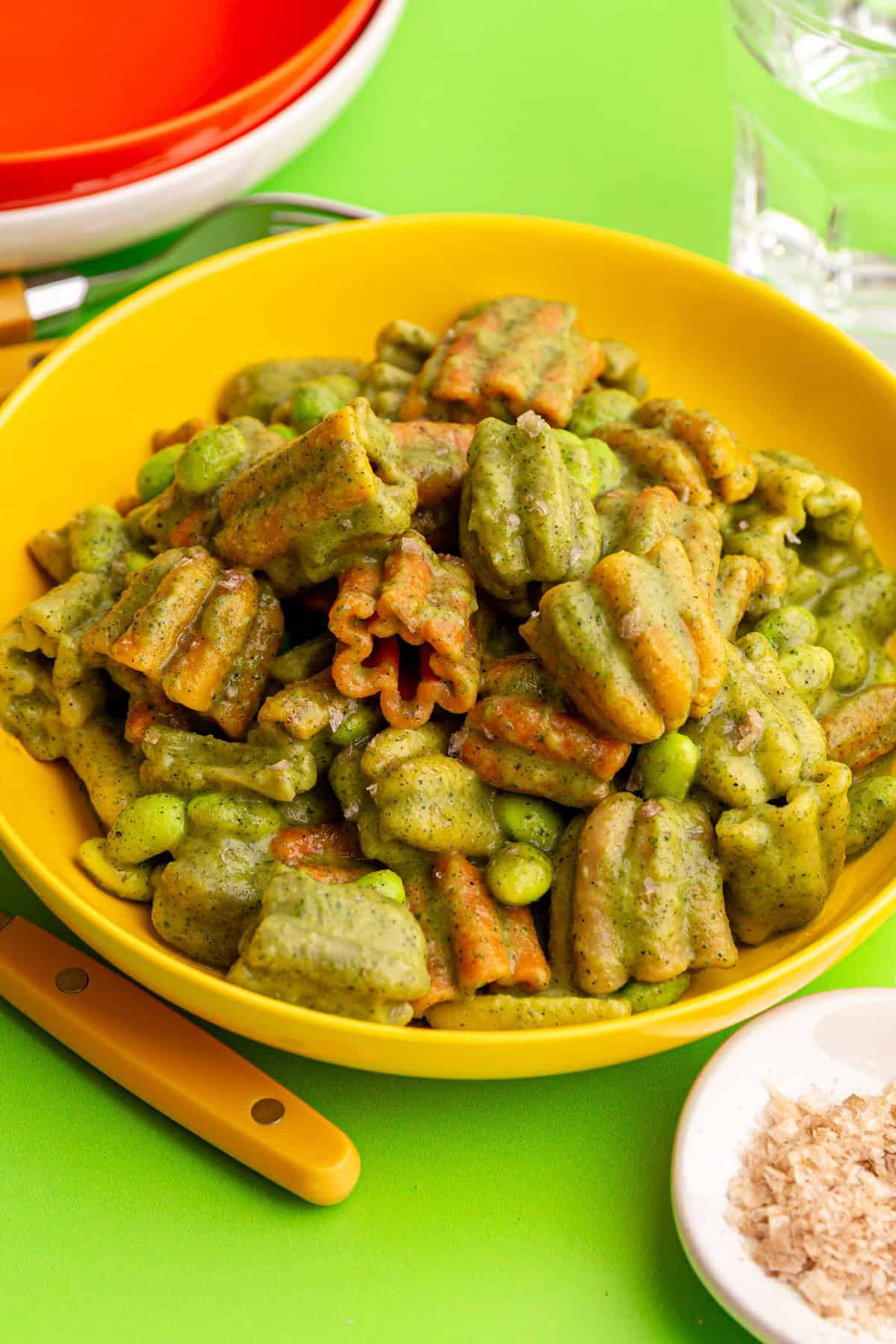 A bowl of vegan zucchini pasta, ready to eat.