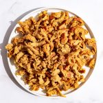 A plate of vegan shredded chicken, ready to use.