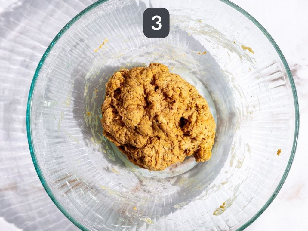 Vegan shredded chicken step 3 - mix in the wet ingredients and knead.