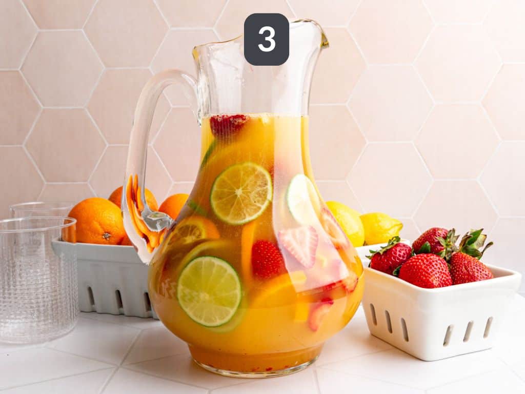 White Sangria Mocktail step 3 - add the seltzer water.