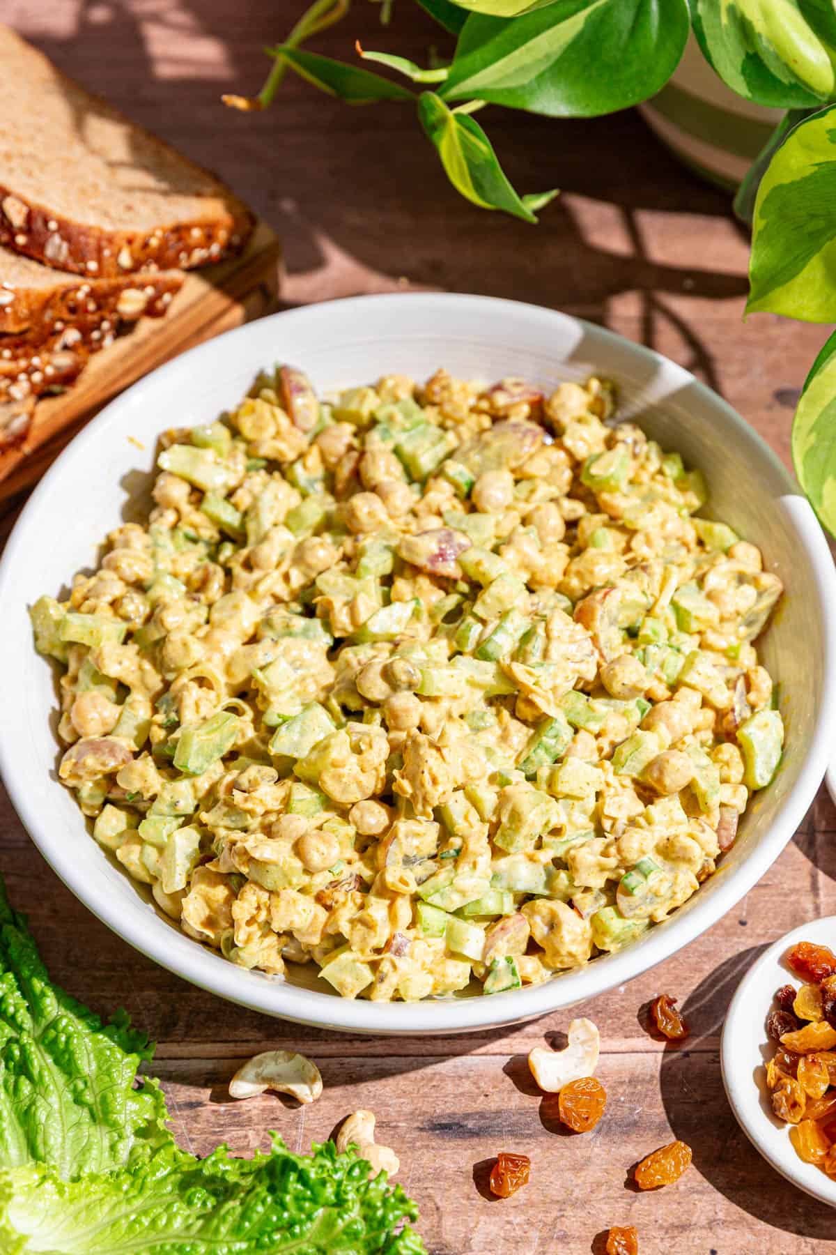 A bowl of freshly made curry chickpea salad.