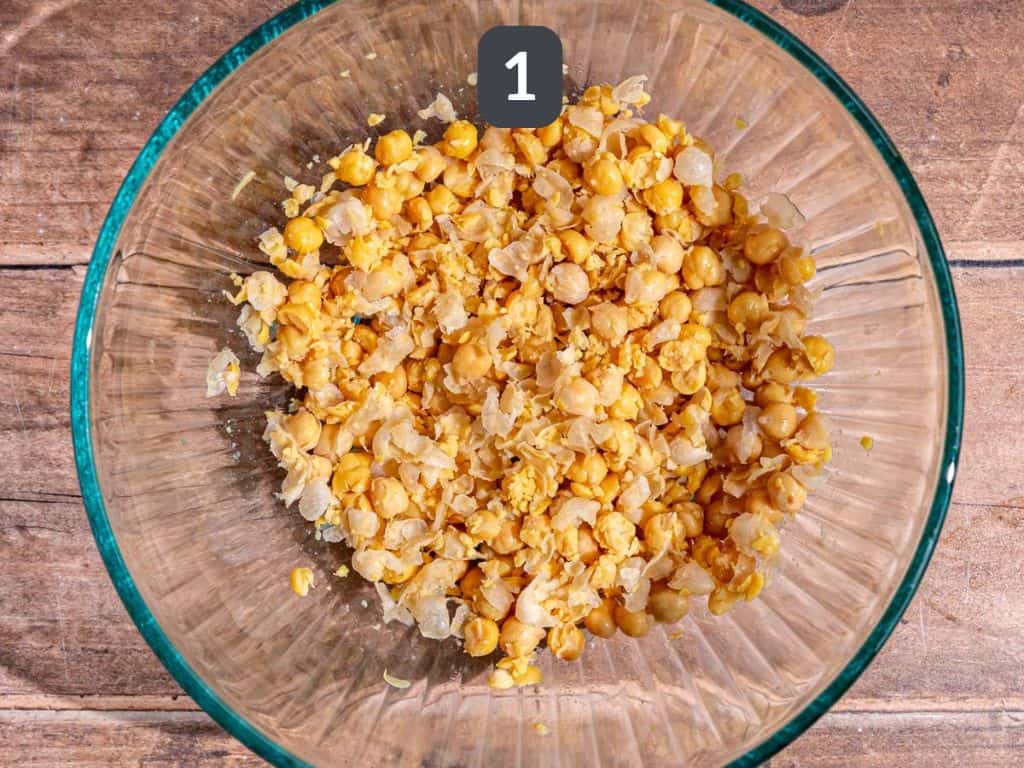 Vegan curry chicken salad step 1 - mash the chickpeas.