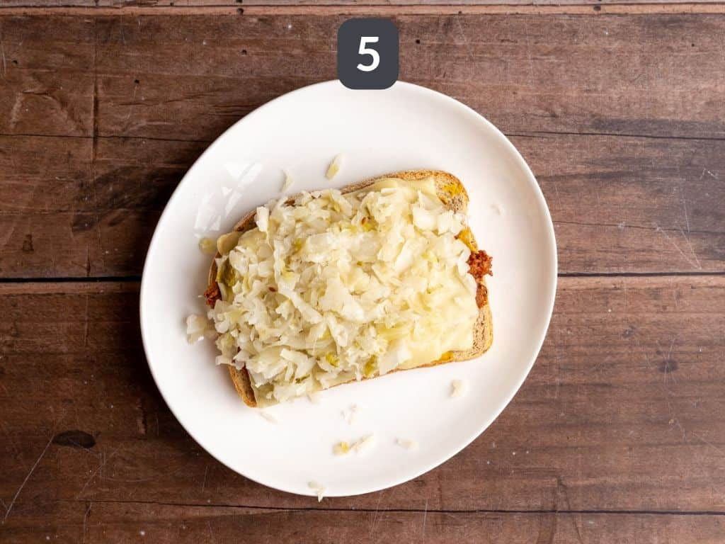 Vegan Pastrami Sandwich Step 5 - top with kraut.