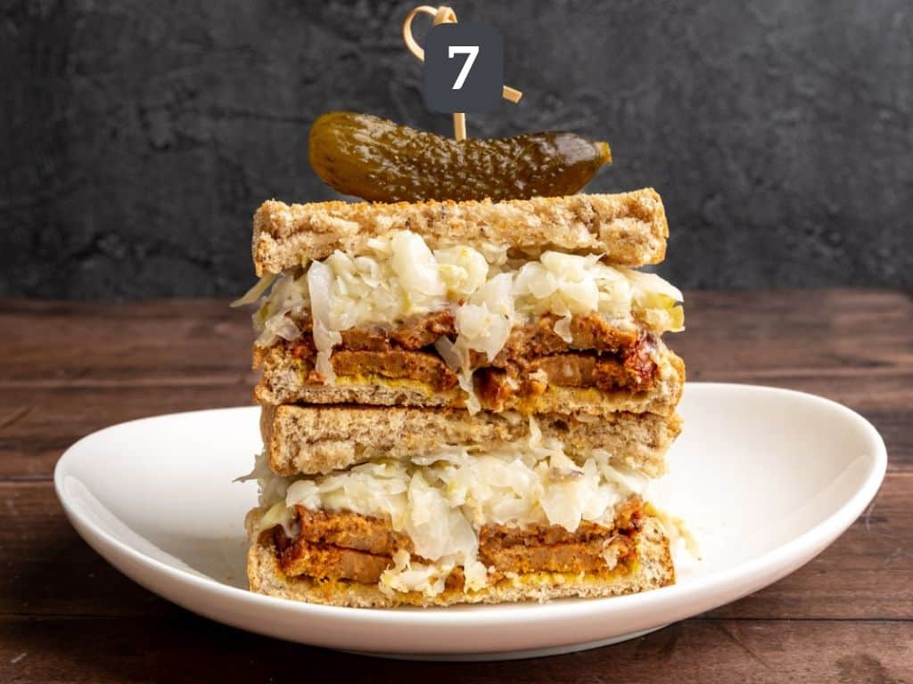 Vegan Pastrami Sandwich Step 7 - skewer with a cornichon.