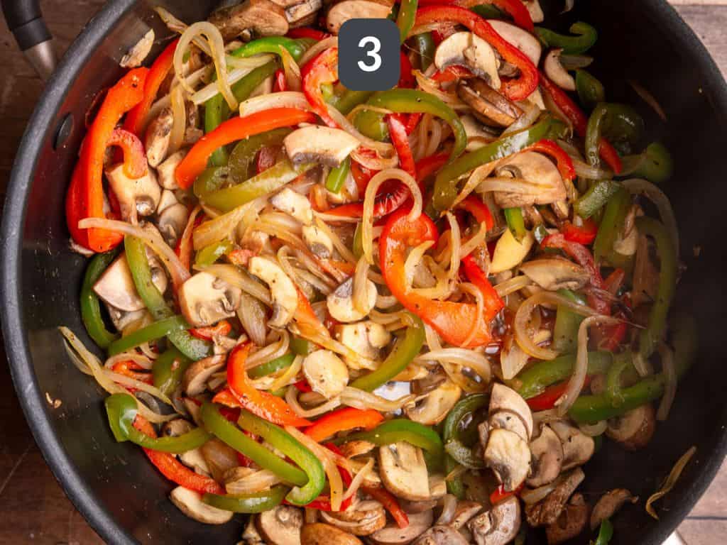 Vegan Philly Cheesesteak Step 3 - add the mushrooms and cook.