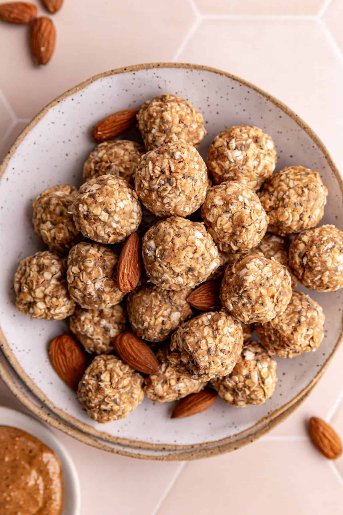 A bowl of almond butter protein balls.
