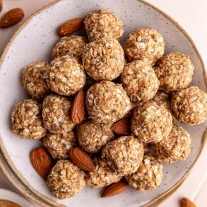 A bowl of almond butter protein balls.