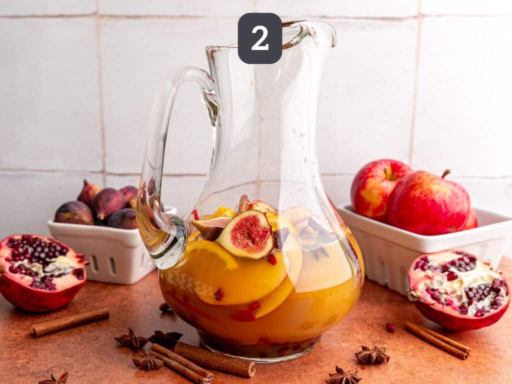 Apple cider sangria mocktail step 2 - add the juices.