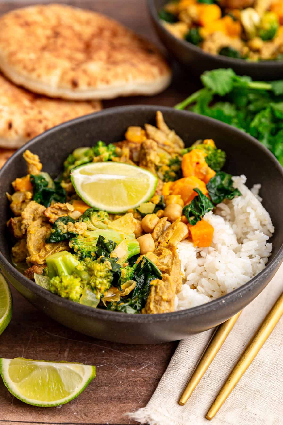 A bowl of seitan curry served over rice.