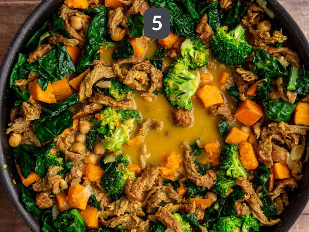 Easy Vegan Seitan Curry Step 5 - stir in the chicken and vegetables.