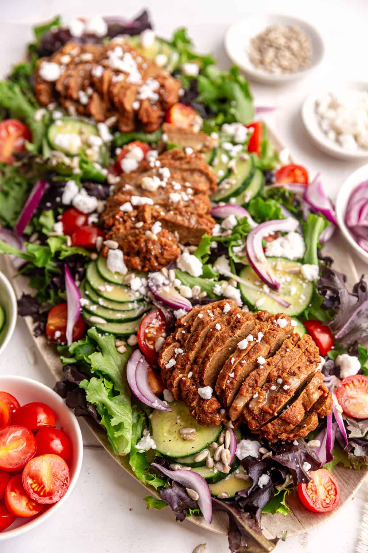 A platter of vegan steak salad.