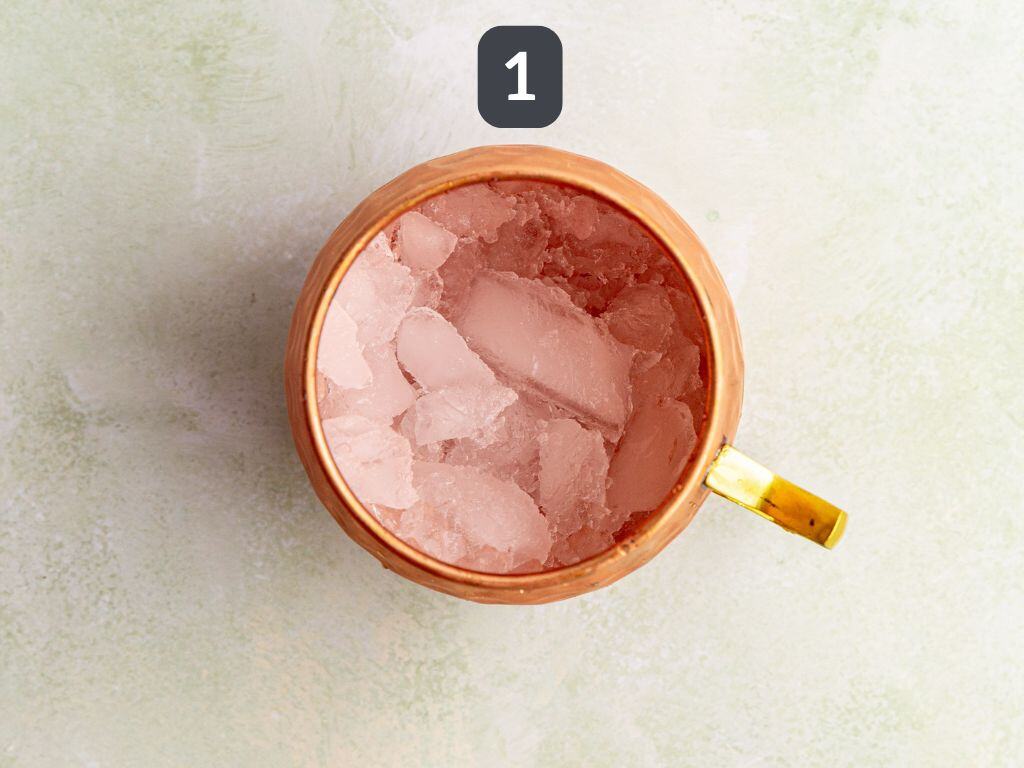 Moscow Mule Mocktail Step 1 - add ice to your glass.