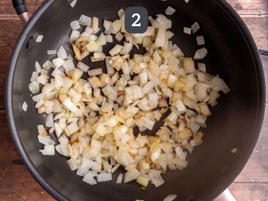 Vegan chorizo pasta step 2 - sauté the onion.