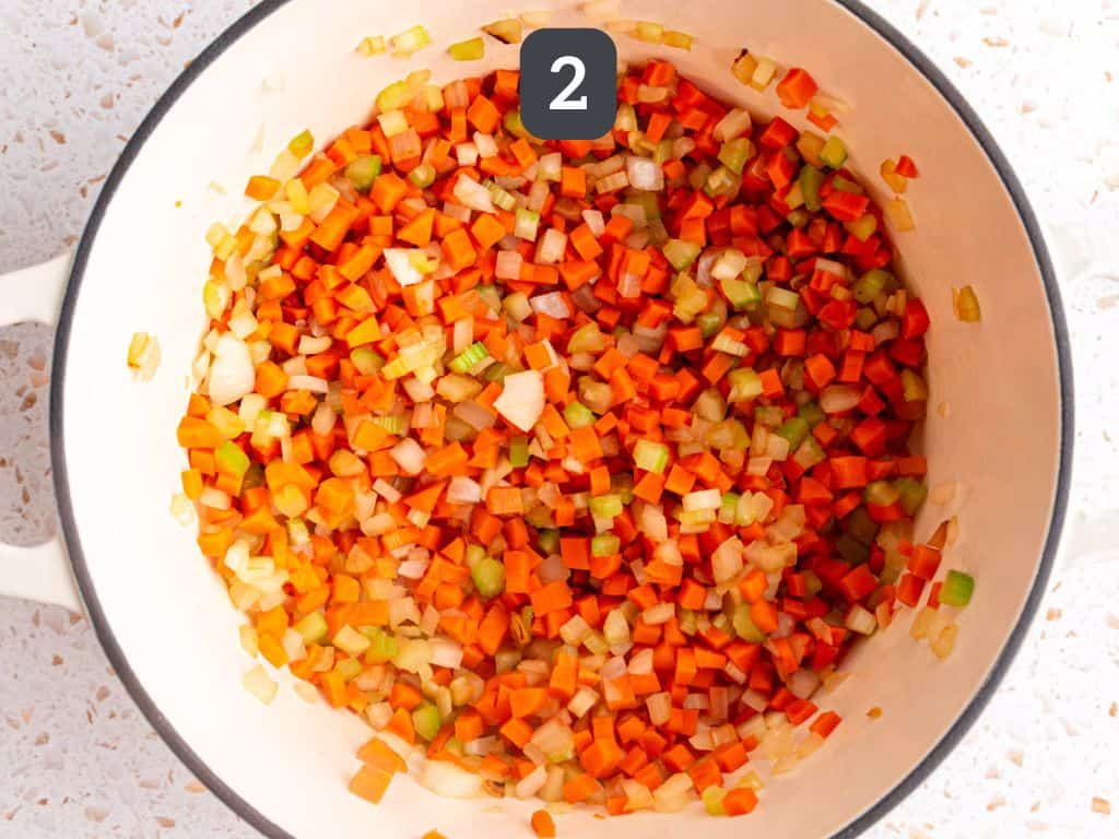 Vegan Italian Wedding Soup Step 2 - sauté the onions, carrot, and celery