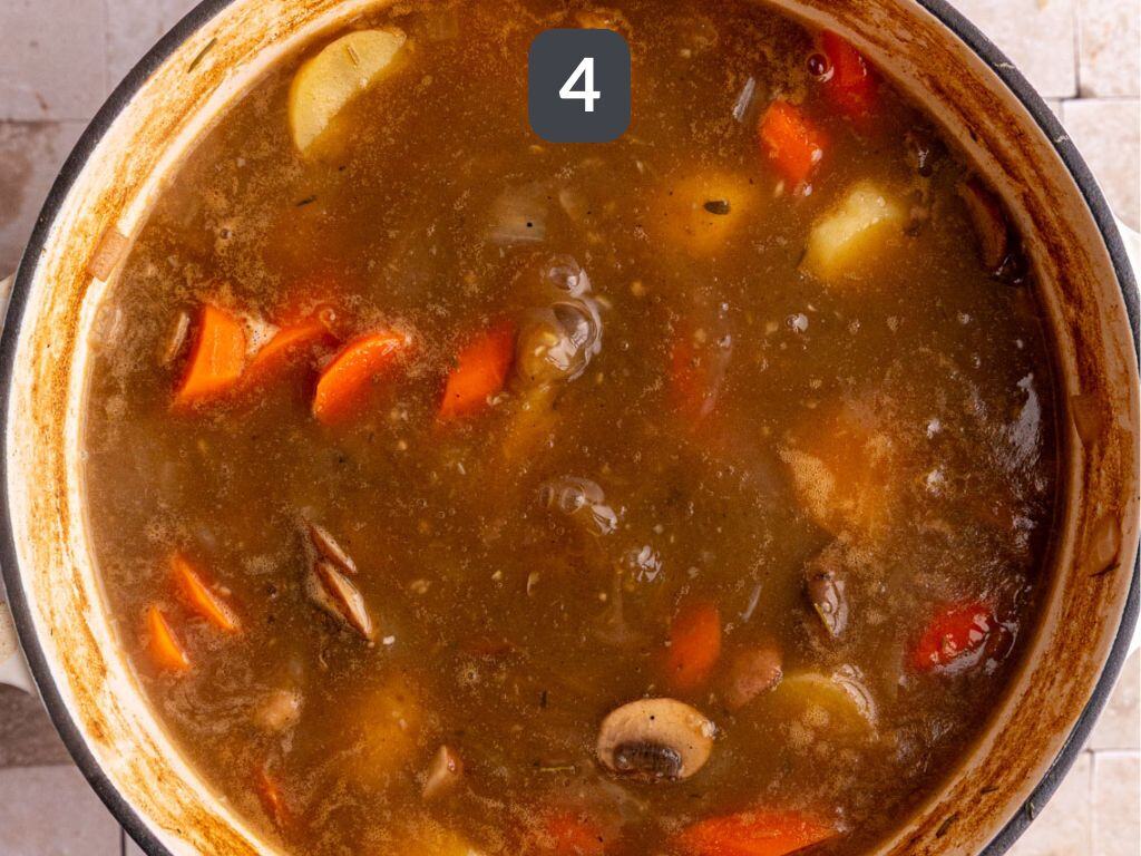Vegan potato stew step 4 - add the veggies and broth and bring to a boil.