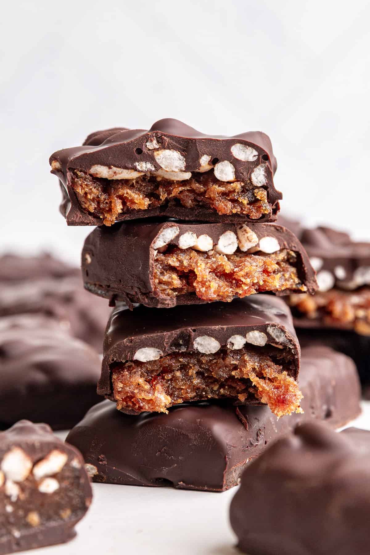 Several cut vegan 100 grand bars stacked on top of each other.