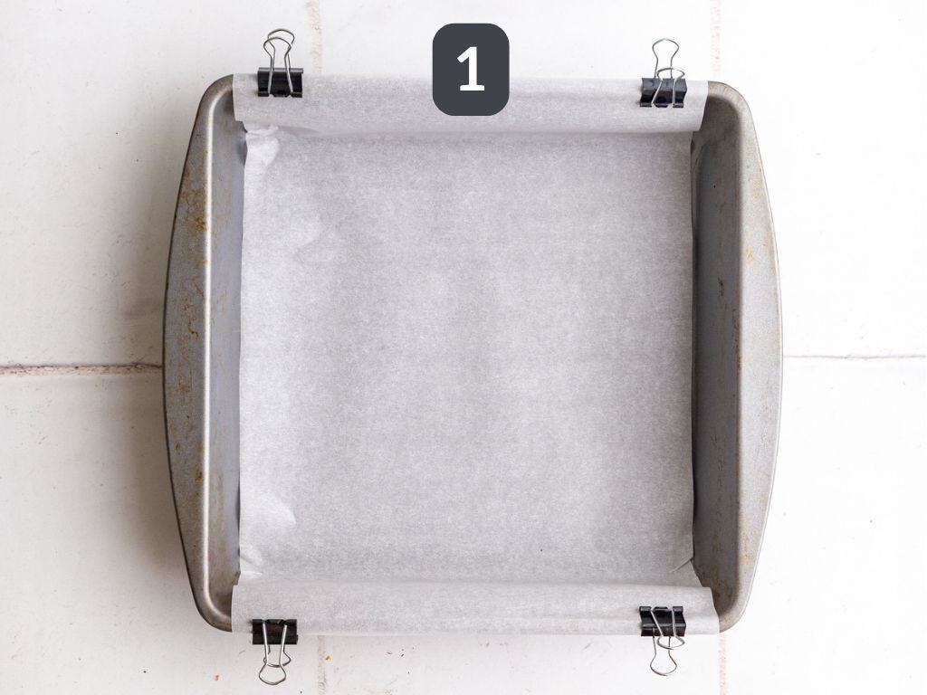 Vegan 100 Grand Bars Step 1 - line the pan with parchment.