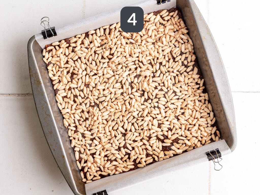 Vegan 100 Grand Bars Step 4 - press in the rice.