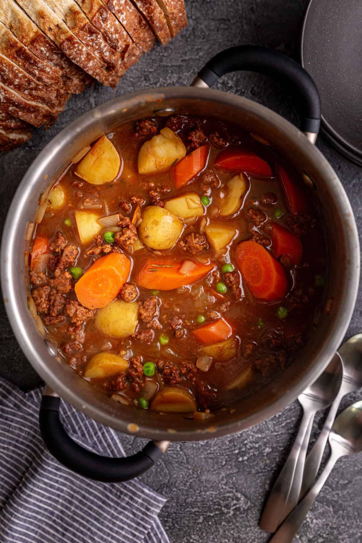A pot of freshly cooked vegan chorizo stew, ready to serve.