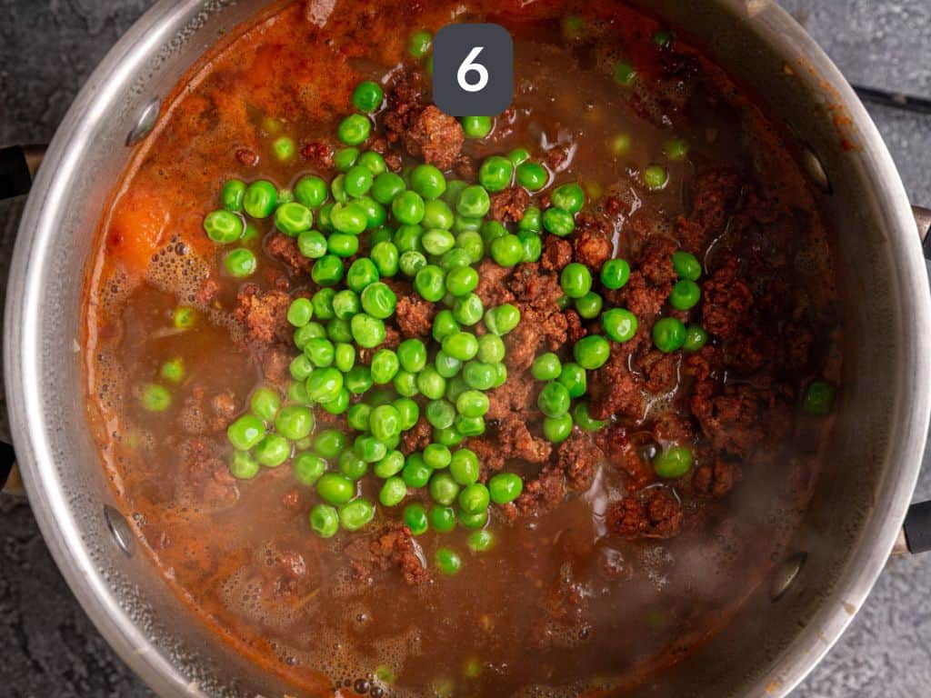 Vegan Chorizo Stew Step 6 - add the chorizo and peas.