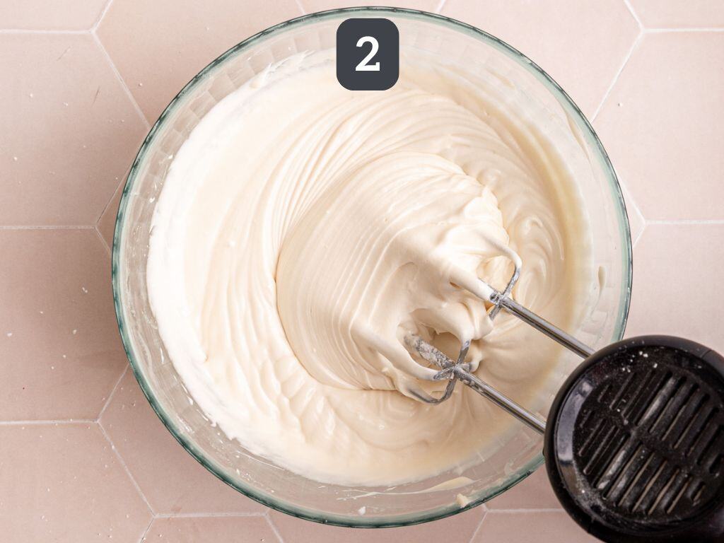 Vegan Cream Cheese Frosting step 2 - beat in the sugar.