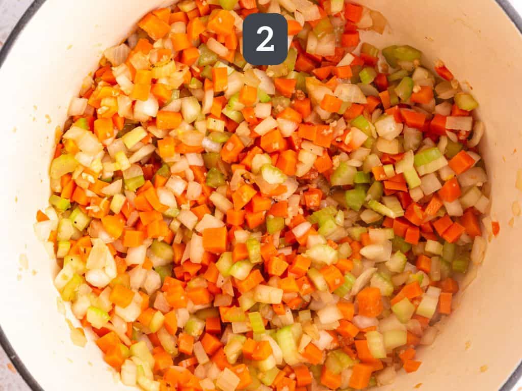 Vegan Pot Pie Soup Step 2 - sauté the onion, carrot, and celery