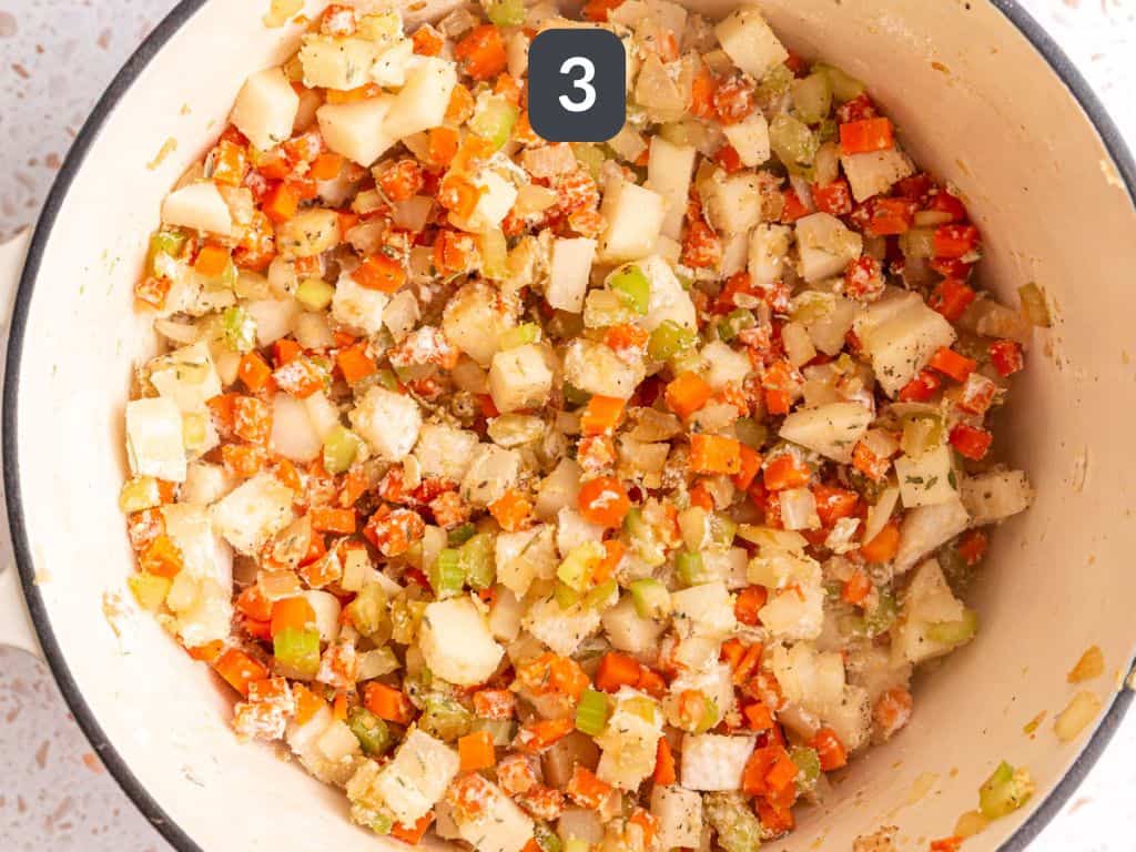 Vegan Pot Pie Soup Step 3 - stir in the herbs and flour