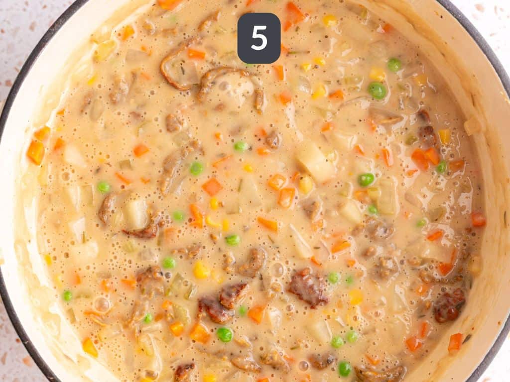 Vegan Pot Pie Soup Step 5 - stir in the chicken, peas, and corn