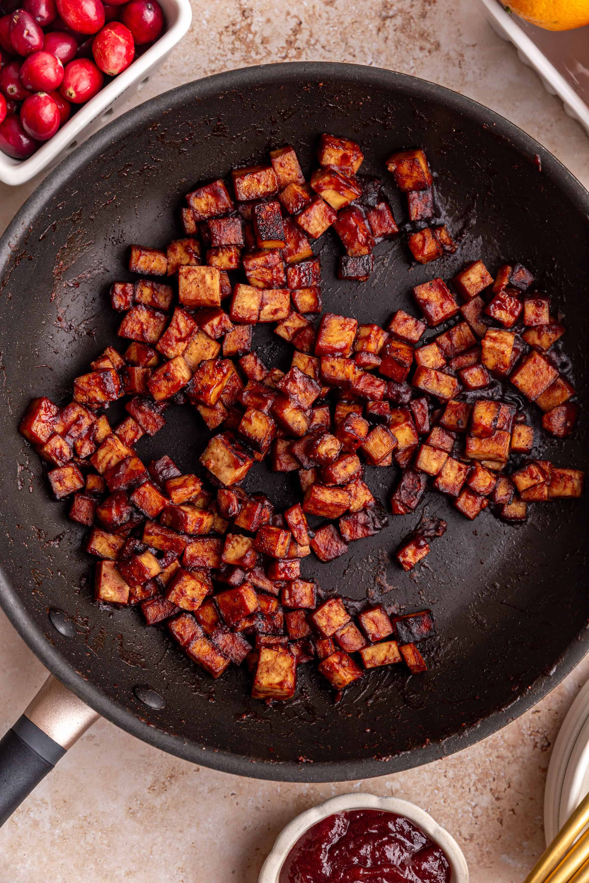 A pan of freshly cooked cranberry orange tofu.
