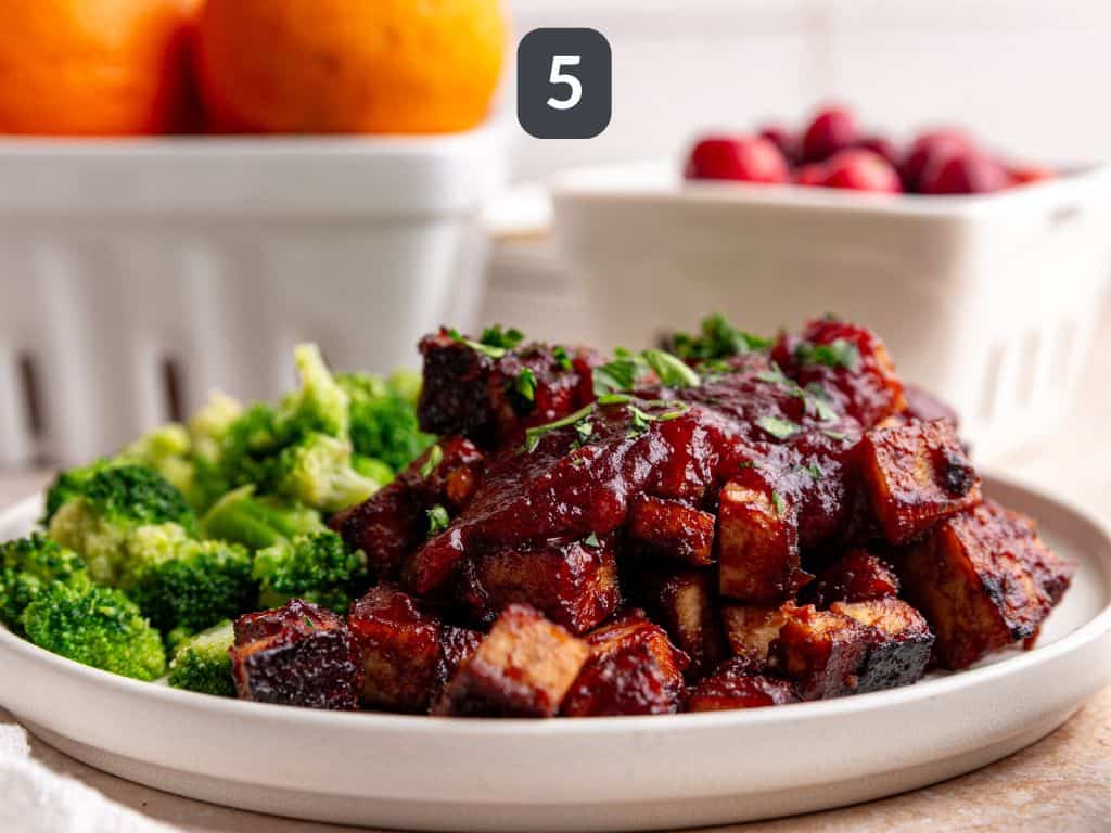 Cranberry Orange Tofu Step 5 - serve with more sauce