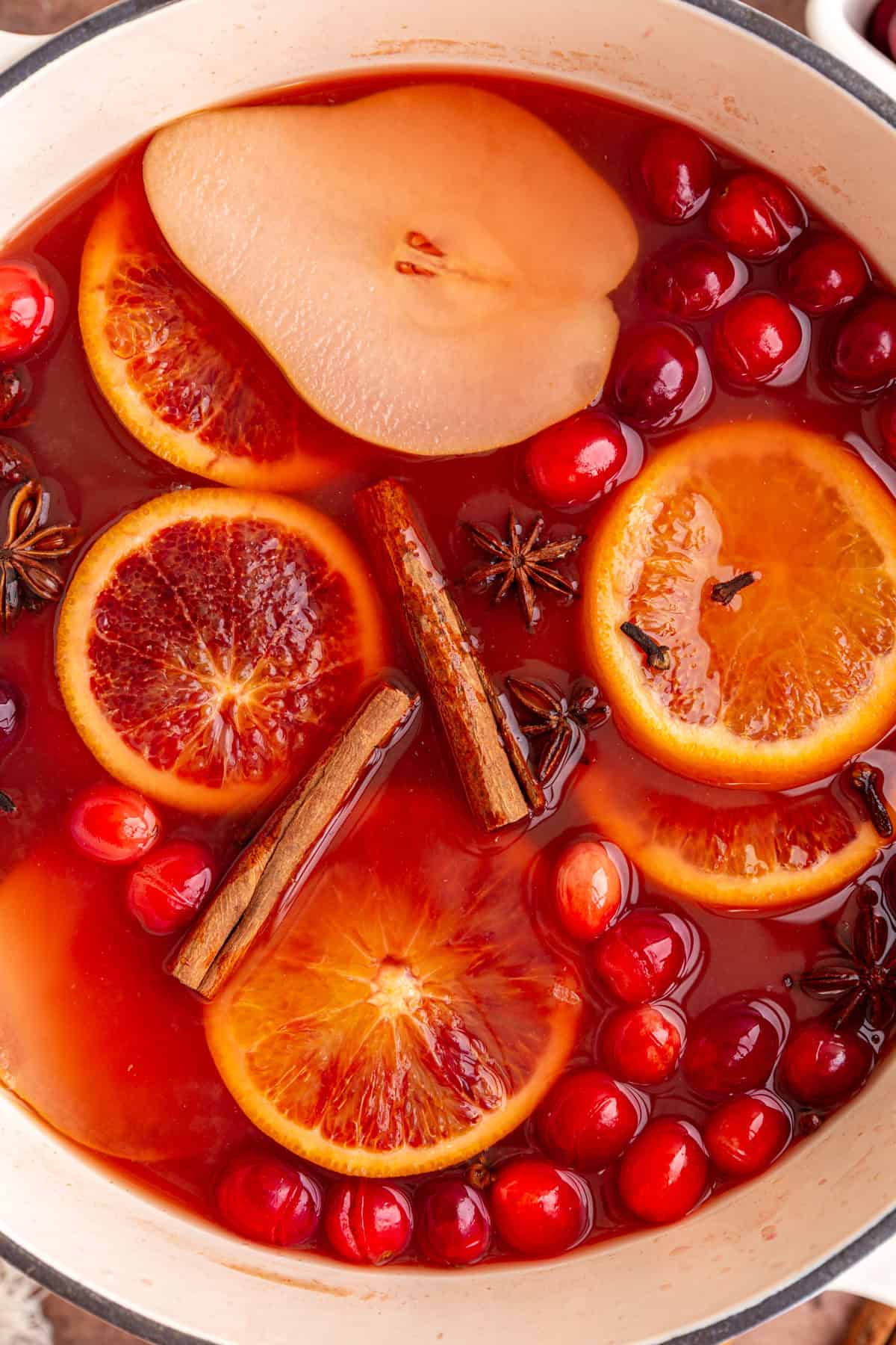 A pot of freshly simmered non alcoholic mulled wine.