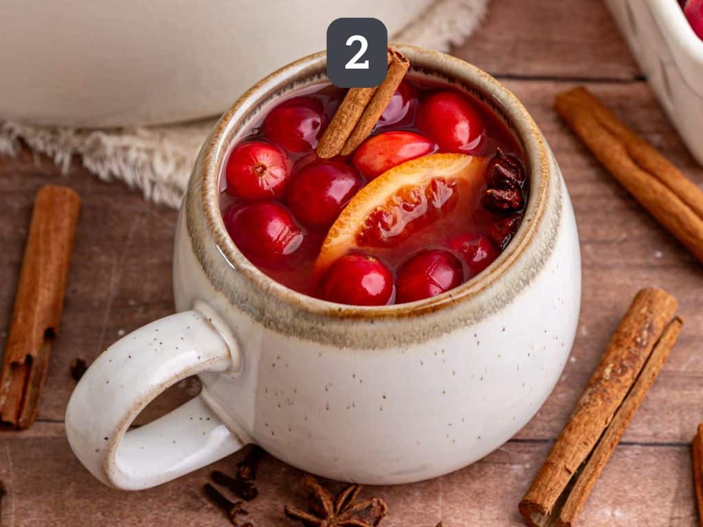 Non alcoholic mulled wine step 2 - serve warm.