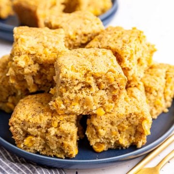 A plate of vegan cornbread casserole slices.