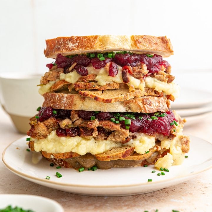 A double decker Vegan Thanksgiving Leftovers Sandwich.