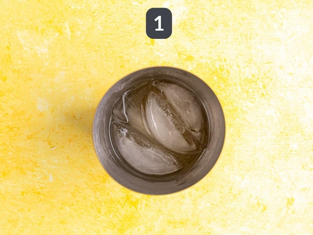 French 75 Mocktail Step 1 - shake together the lemon juice, grape juice, simple syrup, and acv.