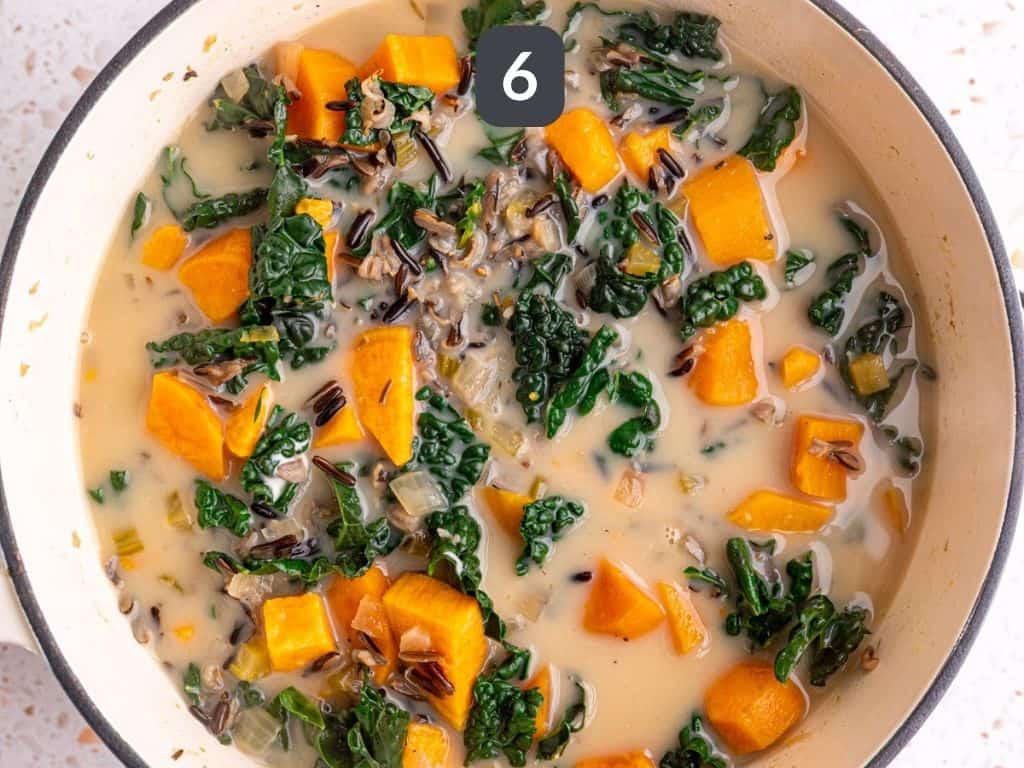 Sweet Potato Wild Rice Soup Step 6 - stir in the kale and yogurt