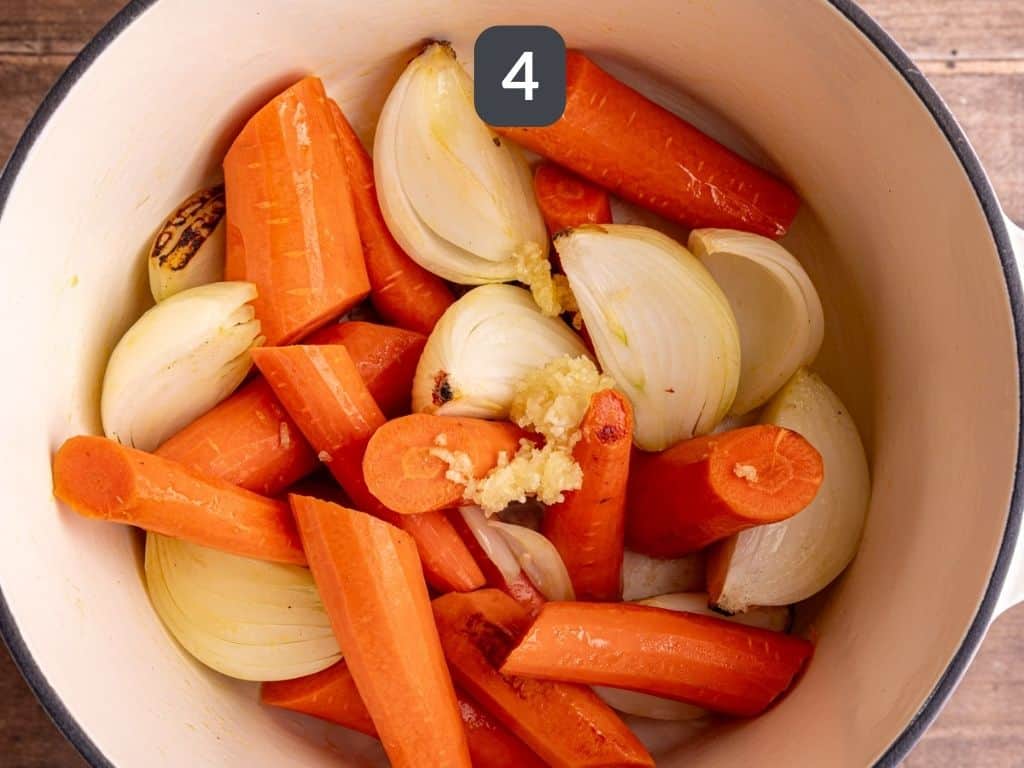 Vegan Pot Roast Step 4 - cook the carrots and onion, add the garlic