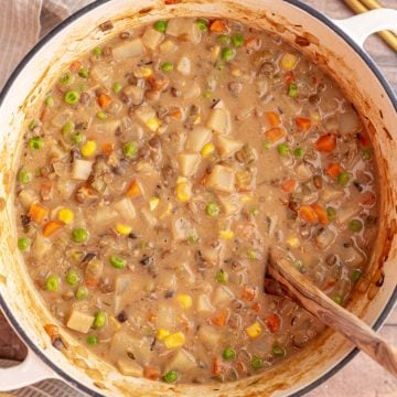 A pot of freshly cooked vegan shepherd's pie soup.