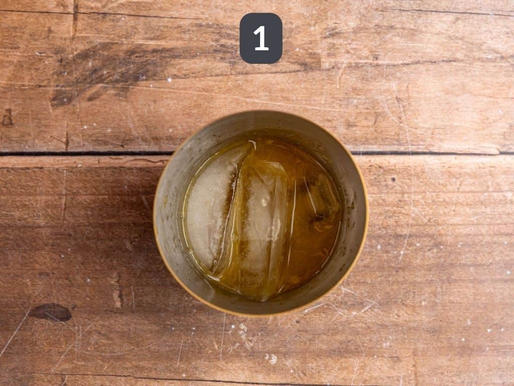 Citrus Mocktail Step 1 - shake together the orange juice and syrup.